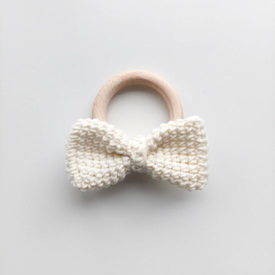 gryzak kokardka kremowy