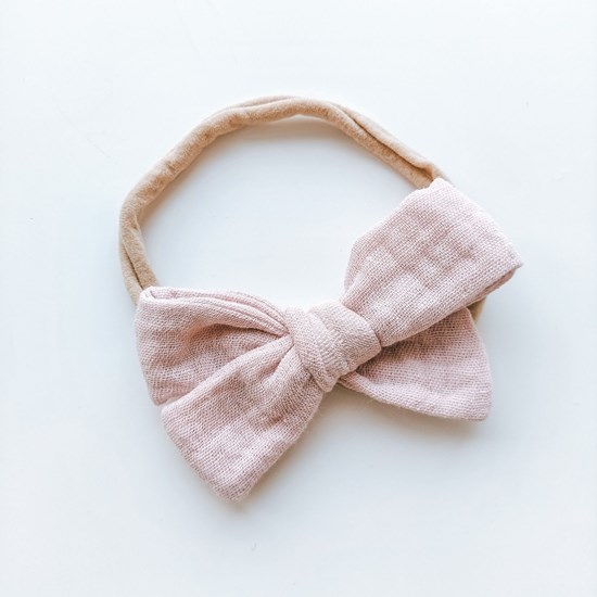 opaska z kokardką w kolorze różu