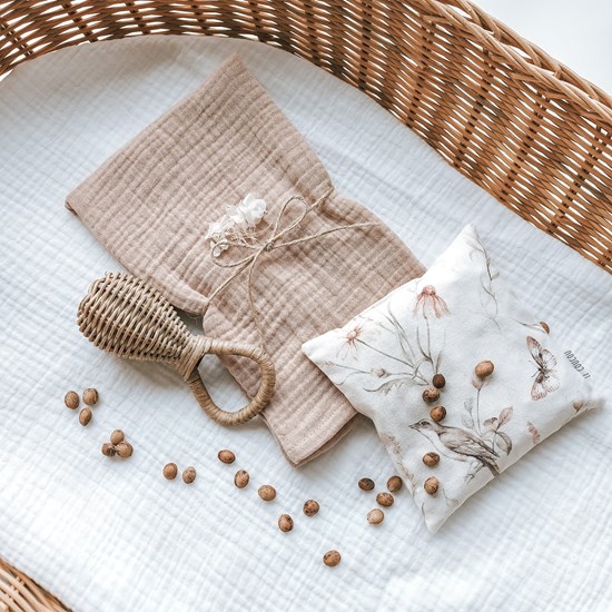 ekologiczny termoforu z pestkami wiśni na kolki i bolący brzuszek