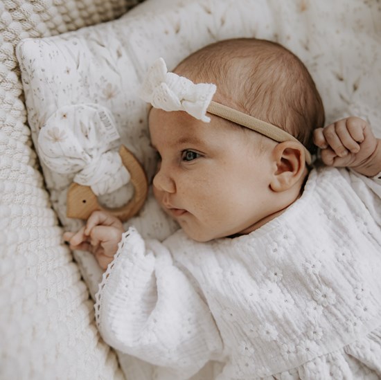 płaska muślinowa poduszka z wypełnieniem wszytym na stałe