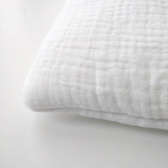 płaska muślinowa poduszka z wypełnieniem wszytym na stałe
