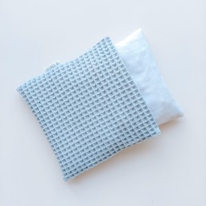 ekologiczny termofor z pestkami wiśni na kolki i bolący brzuszek niemowlaka